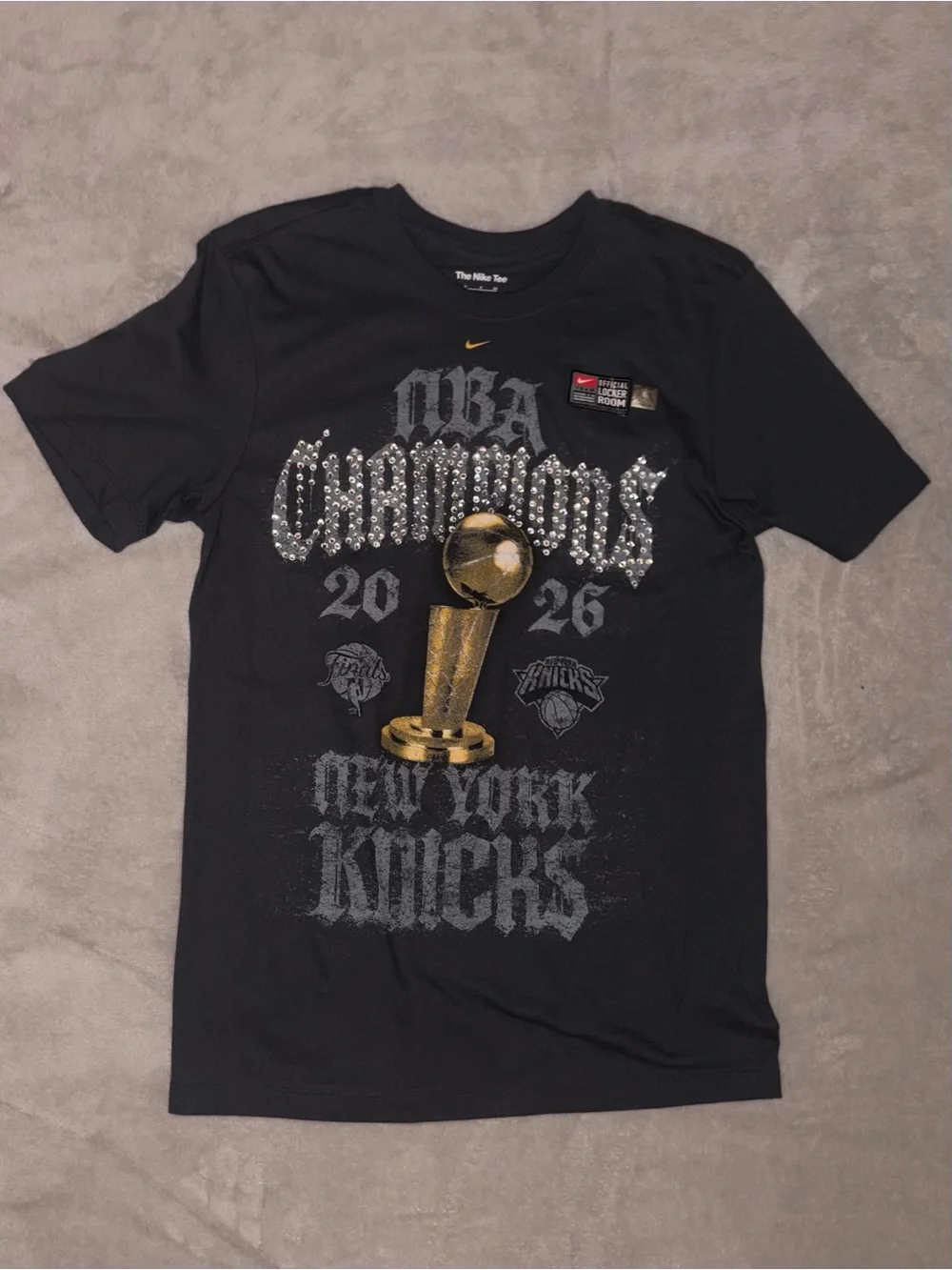 Nike Black New York Knicks NBA Champions Graphic Tee with Gold Trophy
